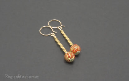 Gold earrings with Murano glass beads